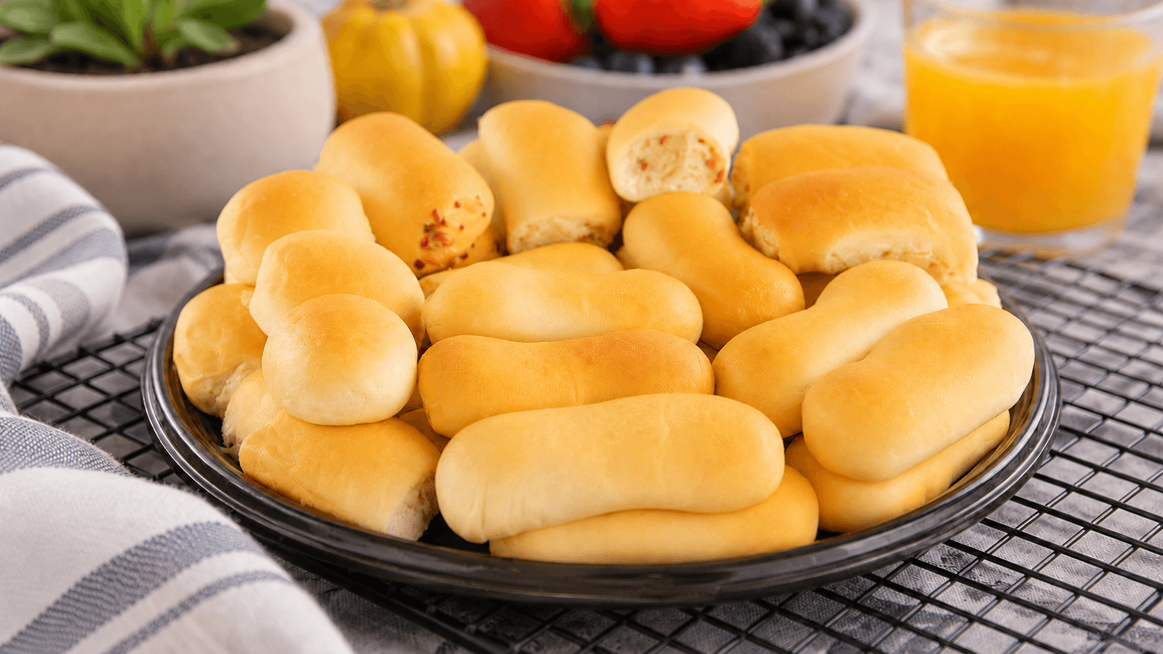 A platter piled high with fresh sausage kolaches